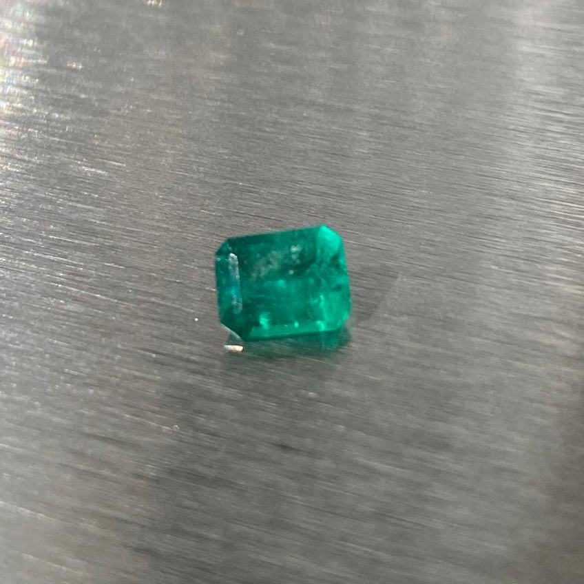 0.51 ct natural Muzo Colombian emerald, face-up view in natural light