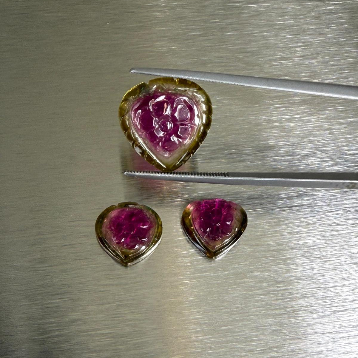 17.41 ctw carved watermelon tourmaline suite, face-up floral carving view, Otzera OTZ-2026-00326