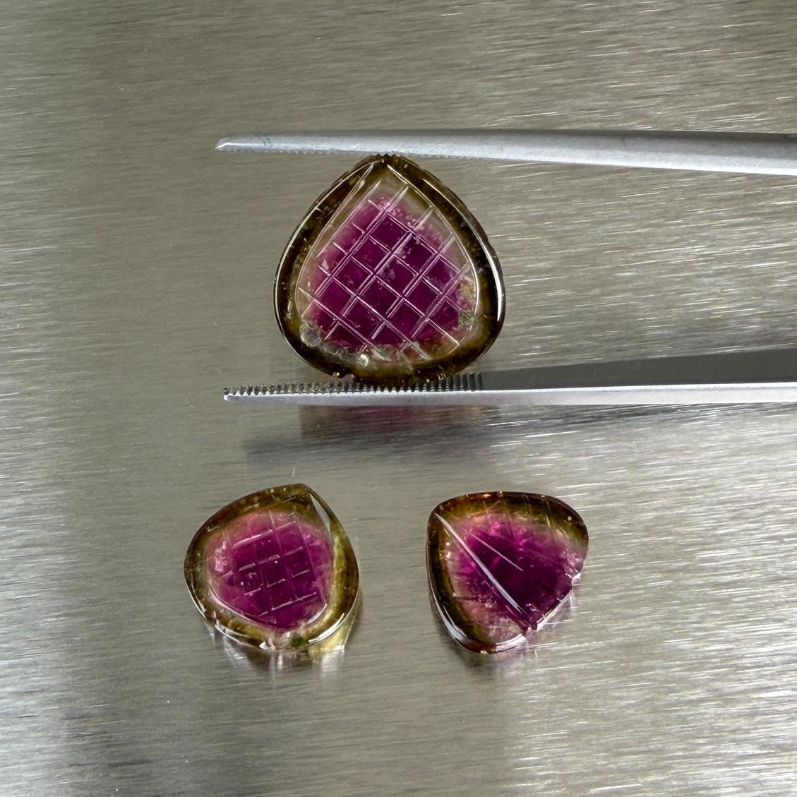17.41 ctw carved watermelon tourmaline suite, reverse view showing natural pink and green color banding, Otzera OTZ-2026-00326