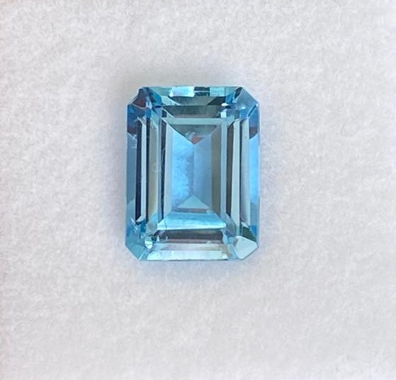 3.22 ct blue emerald-cut aquamarine shown from multiple angles, Otzera OTZ-2026-01628