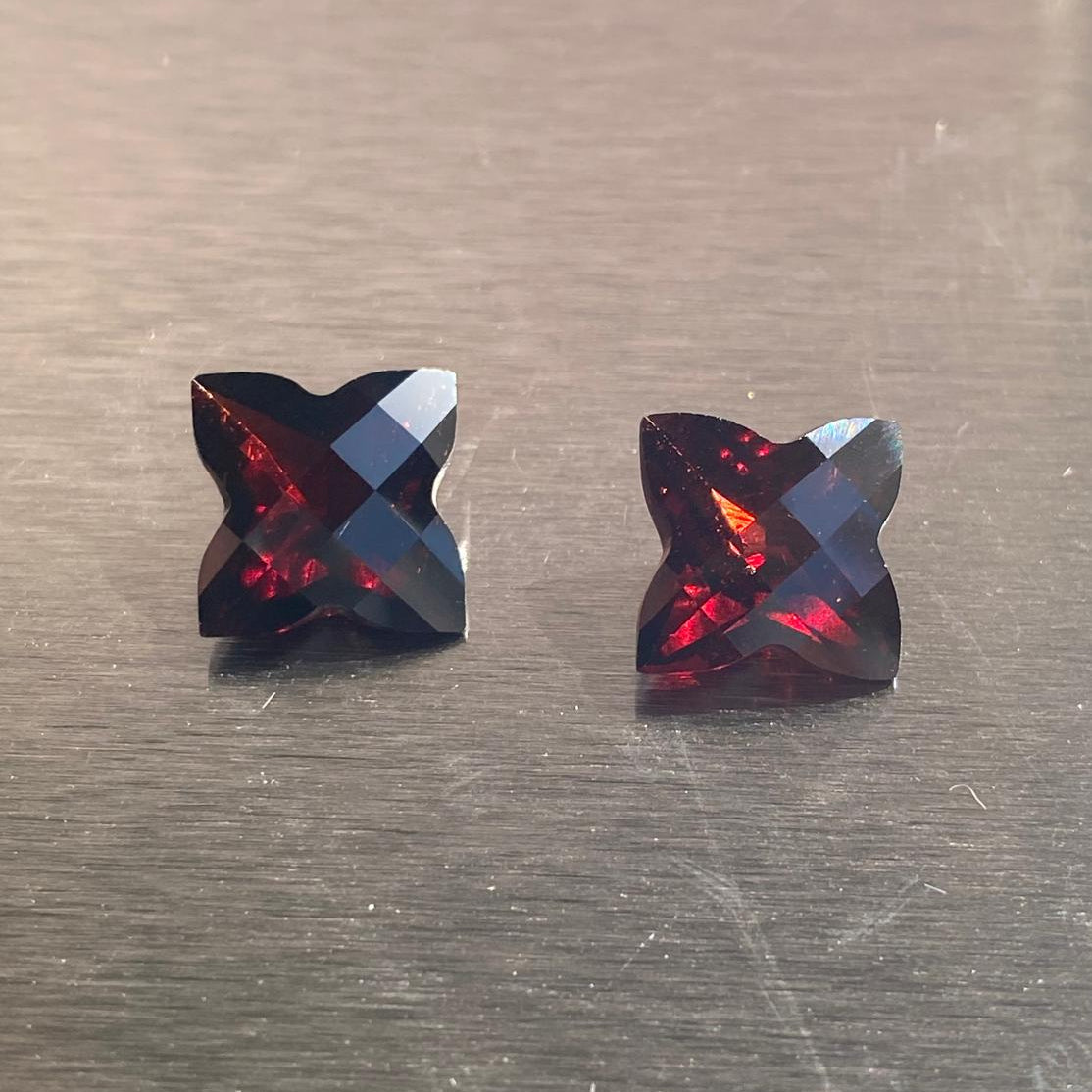 9.51 ctw matched pair of custom-cut deep red almandite garnets, Otzera OTZ-2026-01634