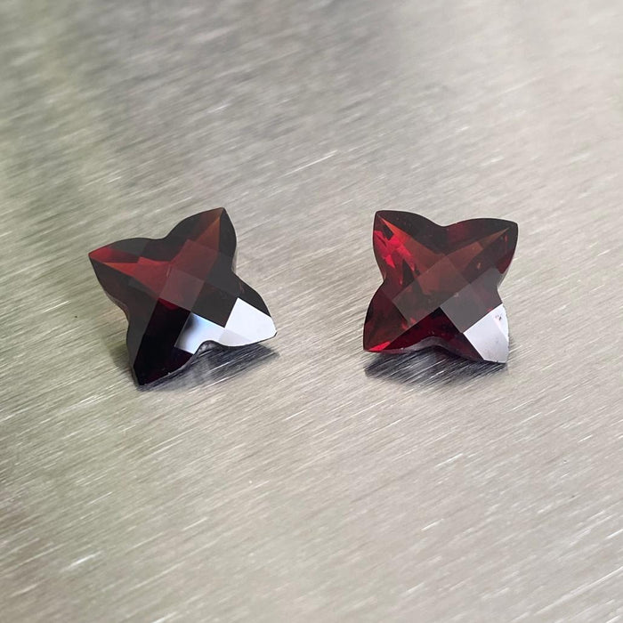 9.51 ctw matched pair of deep red custom-cut almandite garnets with four-point checkerboard-style crowns, Otzera OTZ-2026-01634
