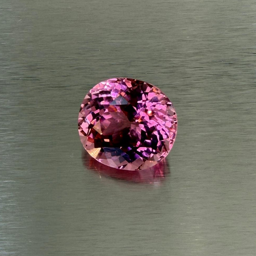 23.58 ct natural pink tourmaline, cushion modified brilliant cut shown face-up, Otzera OTZ-2026-01635