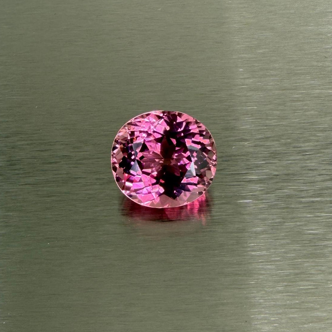 23.58 ct natural pink tourmaline standing face-up with lively pink flashes, Otzera OTZ-2026-01635