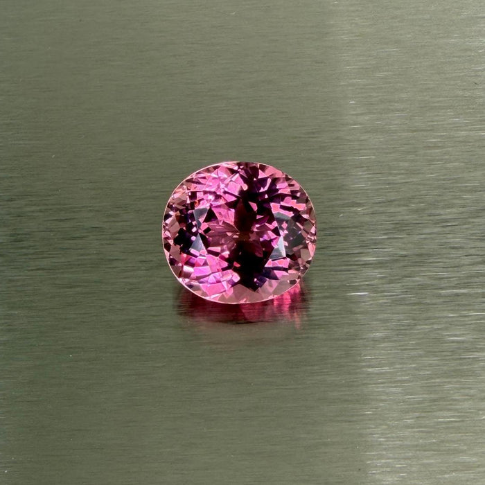 23.58 ct natural pink tourmaline standing face-up with lively pink flashes, Otzera OTZ-2026-01635