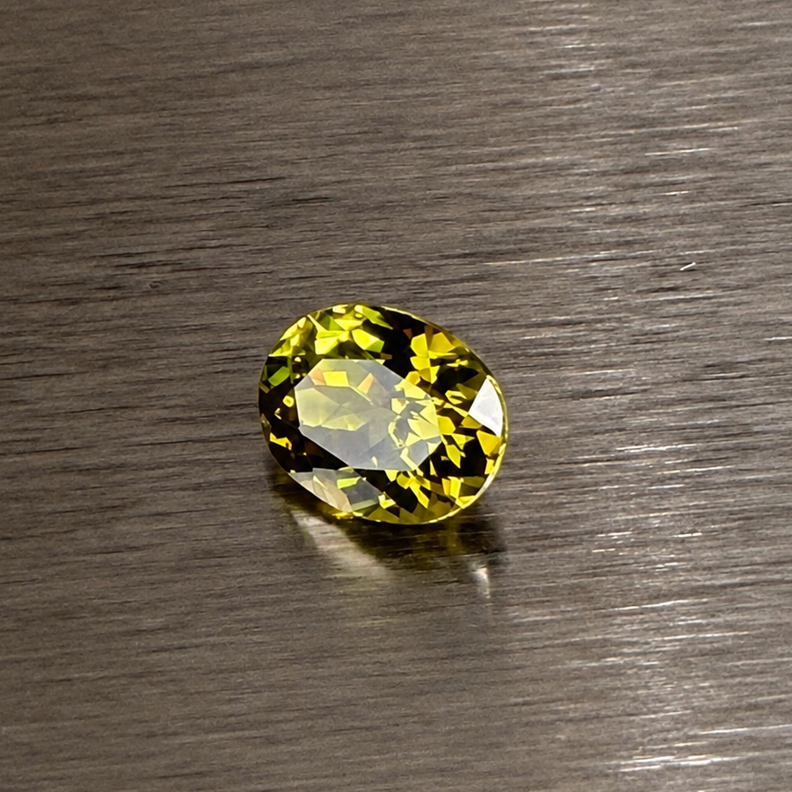 2.22 ct natural Andradite garnet oval modified brilliant face-up view