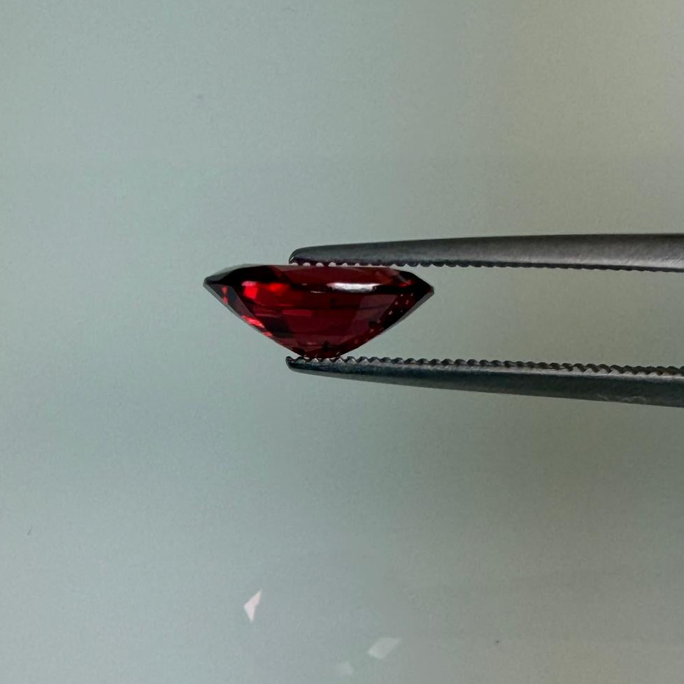 2.13 ct natural red spinel in an oval mixed cut with no treatment, shown from multiple angles, Otzera OTZ-2026-01643