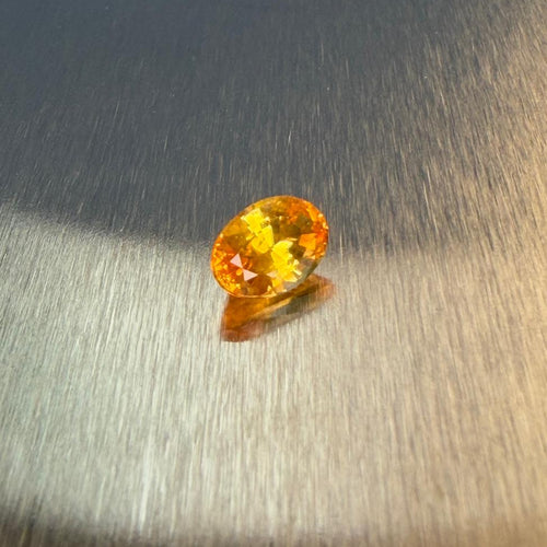 1.38 ct natural yellow sapphire from Sri Lanka in an oval mixed cut, alternate face-up view, Otzera OTZ-2026-01648