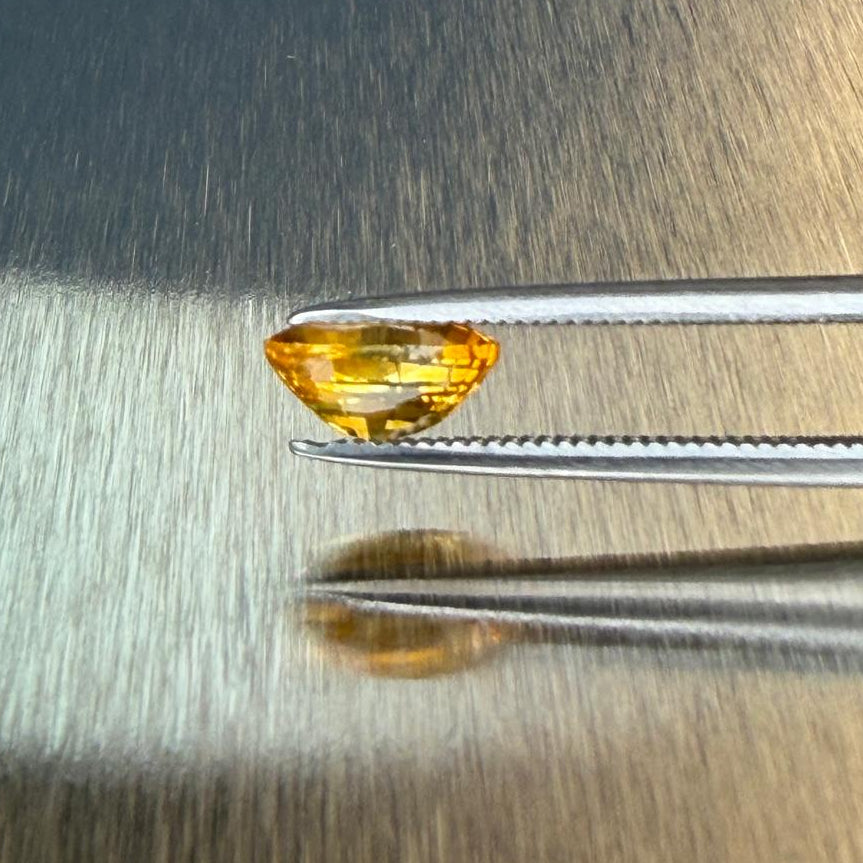 1.38 ct natural yellow sapphire from Sri Lanka in an oval mixed cut, side profile, Otzera OTZ-2026-01648