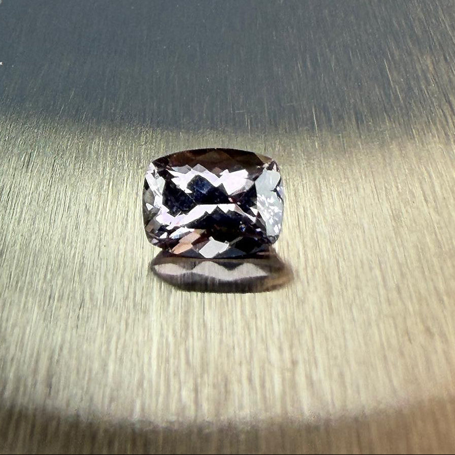 1.70 ct natural purple spinel in a cushion modified brilliant cut, shown from multiple angles, Otzera OTZ-2026-01651