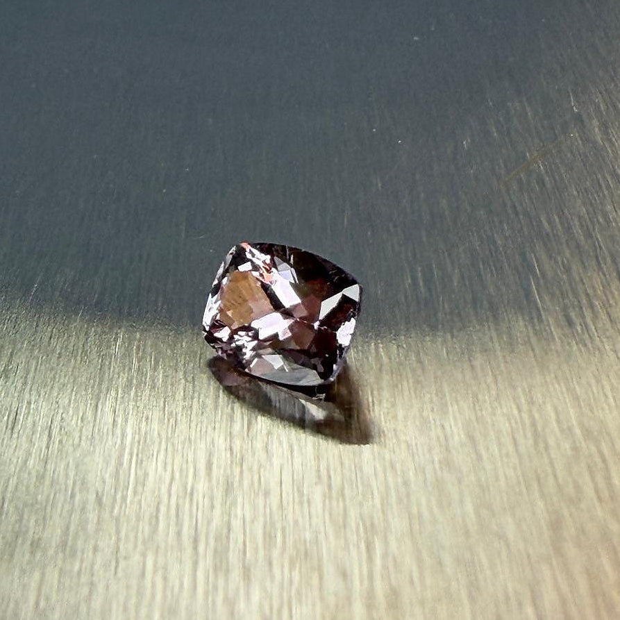 1.70 ct natural purple spinel in a cushion modified brilliant cut, shown from multiple angles, Otzera OTZ-2026-01651