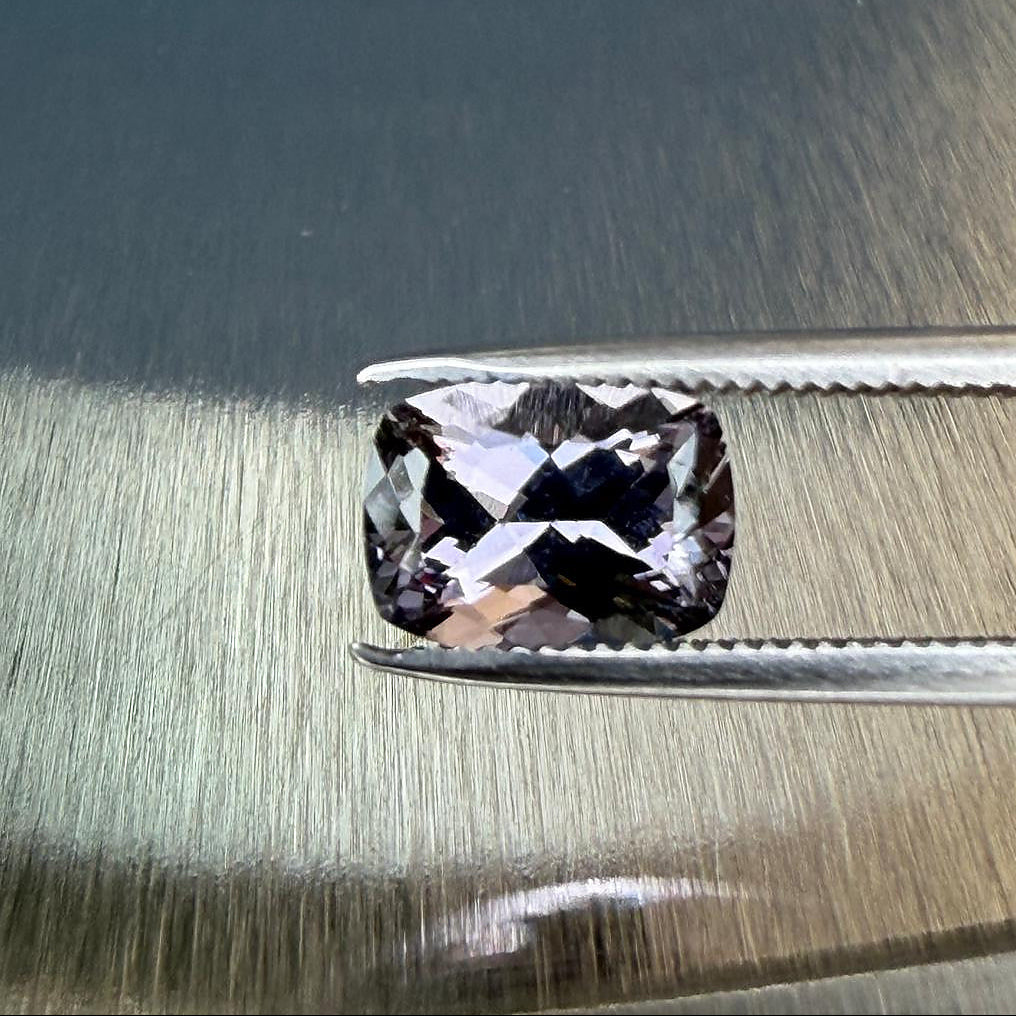 1.70 ct natural purple spinel in a cushion modified brilliant cut, shown from multiple angles, Otzera OTZ-2026-01651
