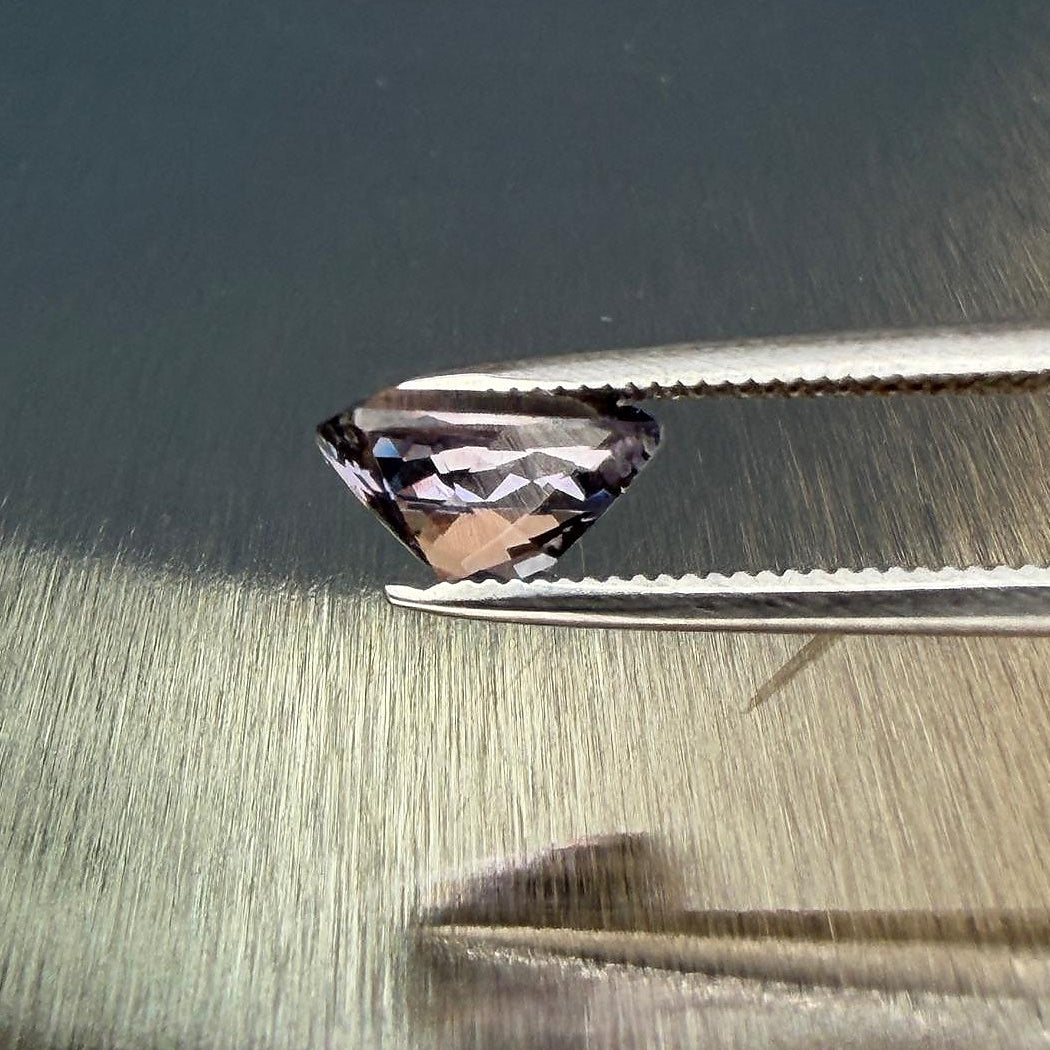 1.70 ct natural purple spinel in a cushion modified brilliant cut, shown from multiple angles, Otzera OTZ-2026-01651