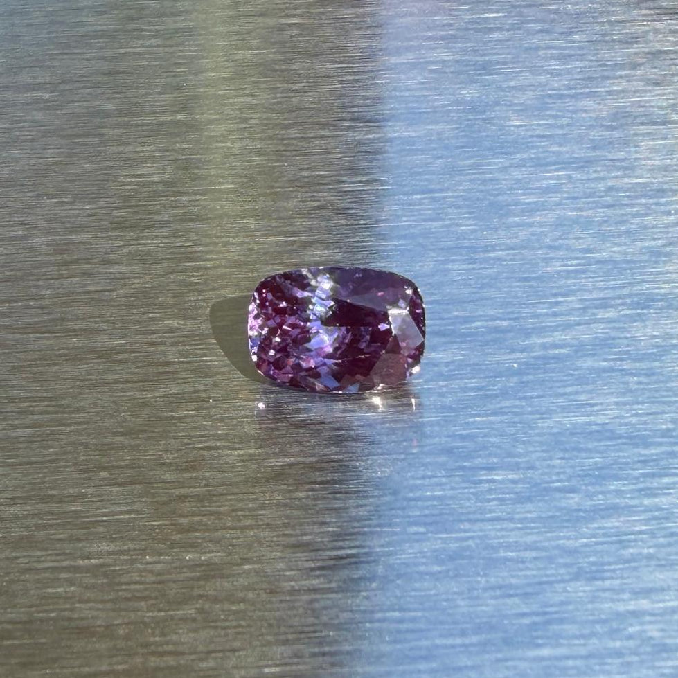 2.82 ct heated natural pinkish purple sapphire, cushion cut, face-up view