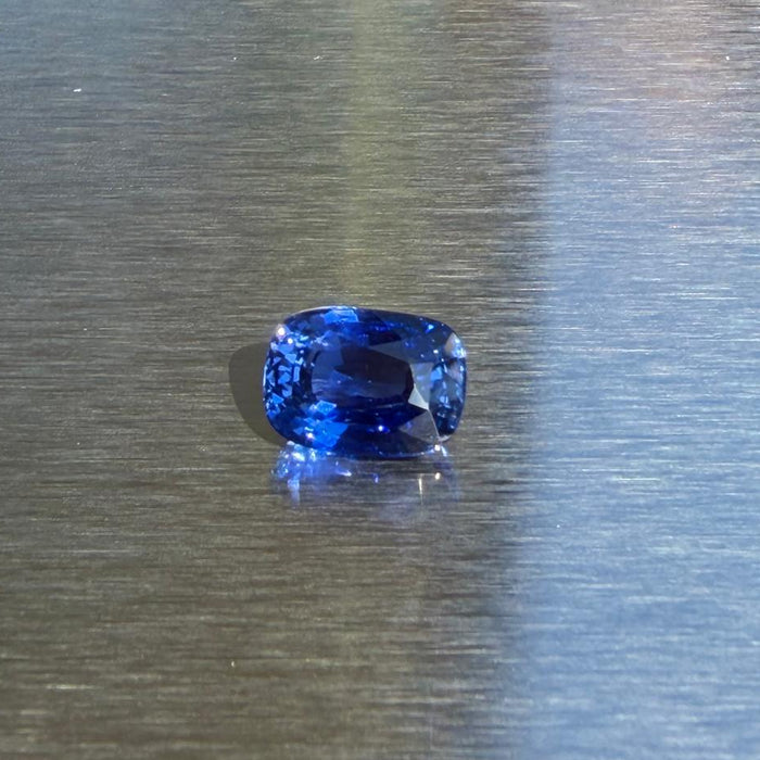 4.06 ct heated natural blue sapphire from Sri Lanka, cushion mixed cut, face-up view