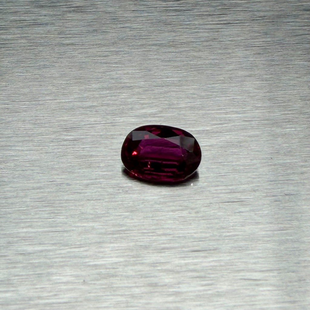 1.82 ct heated natural ruby, oval mixed cut, face-up view, Otzera OTZ-2026-01662