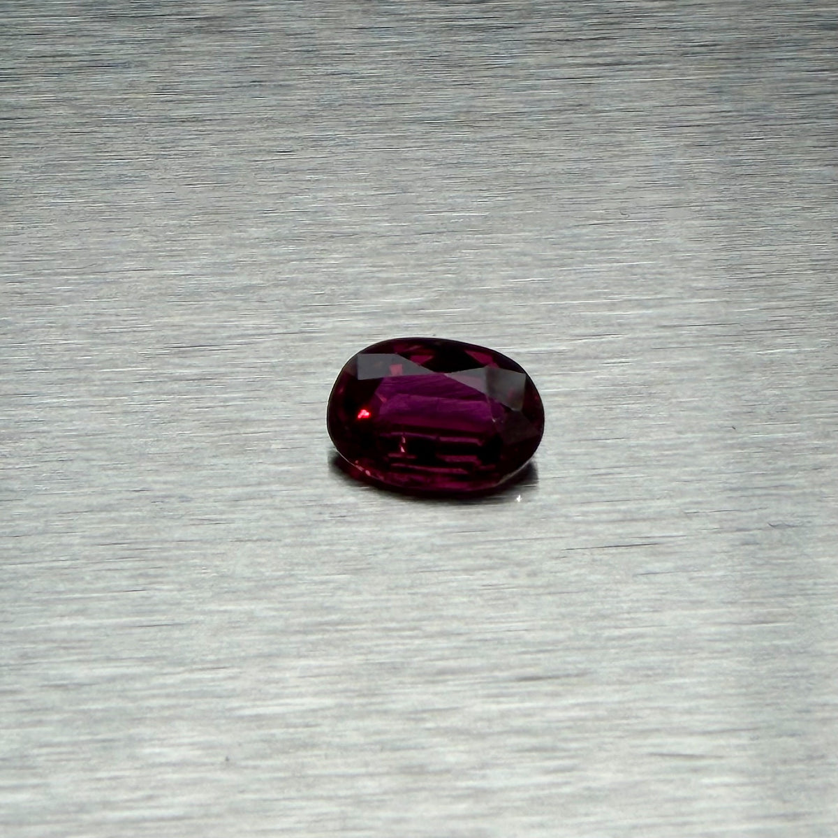 1.82 ct heated natural ruby, oval mixed cut, face-up view, Otzera OTZ-2026-01662