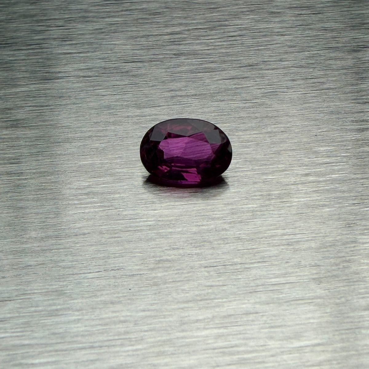 1.66 ct natural unheated ruby, oval mixed cut, face-up view, Otzera OTZ-2026-01665