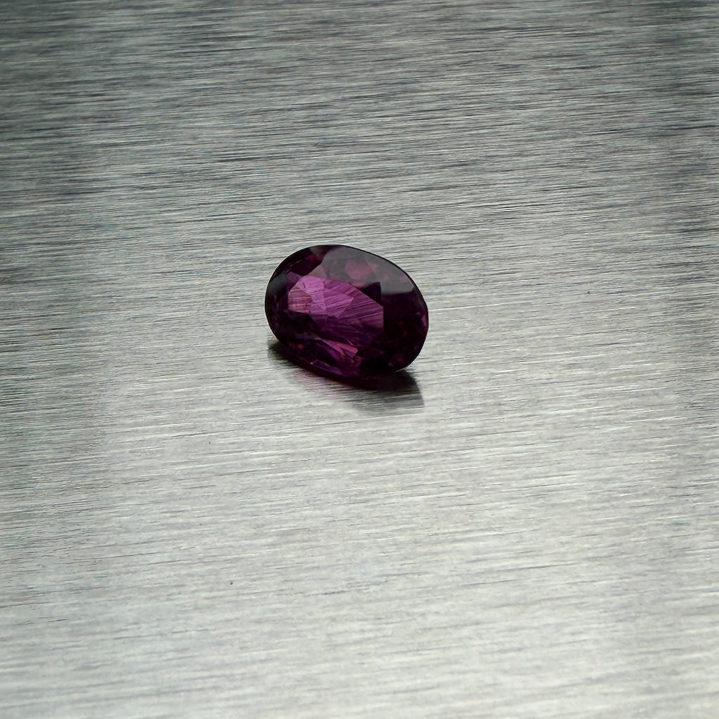 1.66 ct natural ruby, oval mixed cut, alternate face-up view showing saturated red color, Otzera OTZ-2026-01665