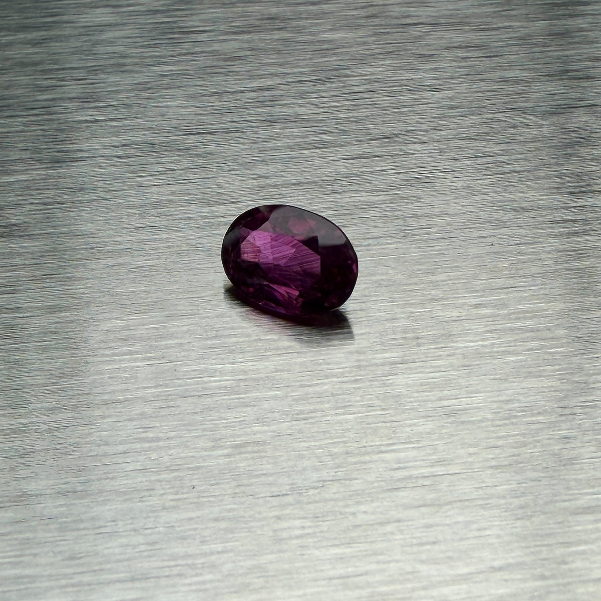 1.66 ct natural ruby, oval mixed cut, alternate face-up view showing saturated red color, Otzera OTZ-2026-01665