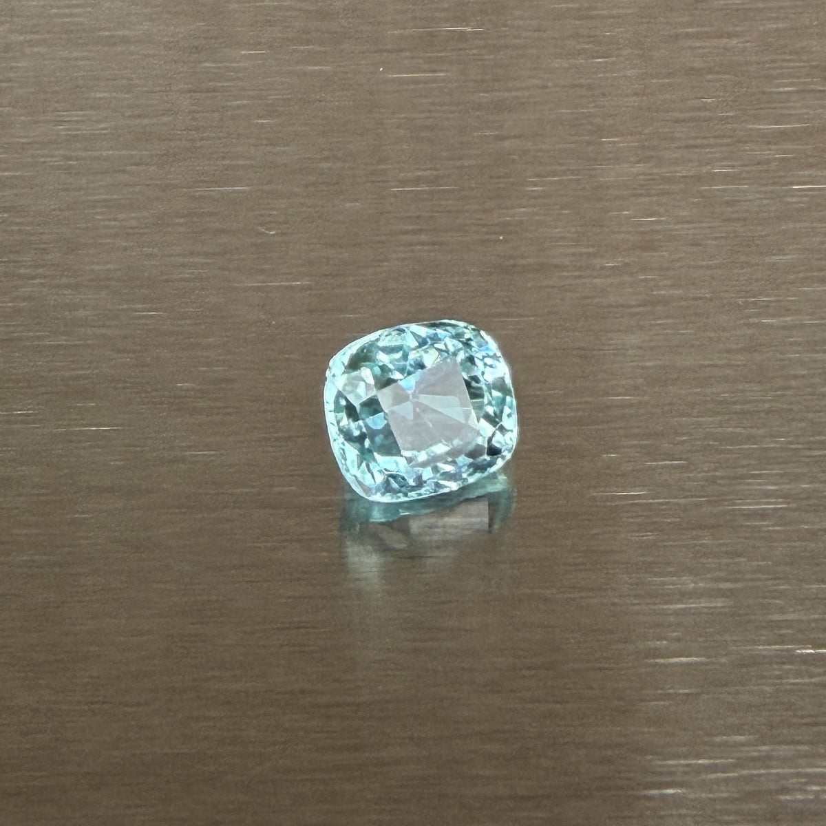 3.07 ct aquamarine, antique cushion mixed cut, alternate face-up view showing pale blue color, Otzera OTZ-2026-01667