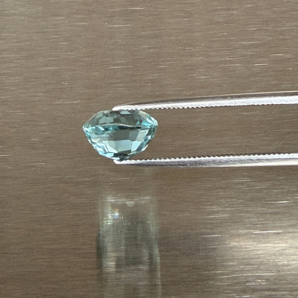 3.07 ct aquamarine held in tweezers, side profile showing antique cut depth, Otzera OTZ-2026-01667