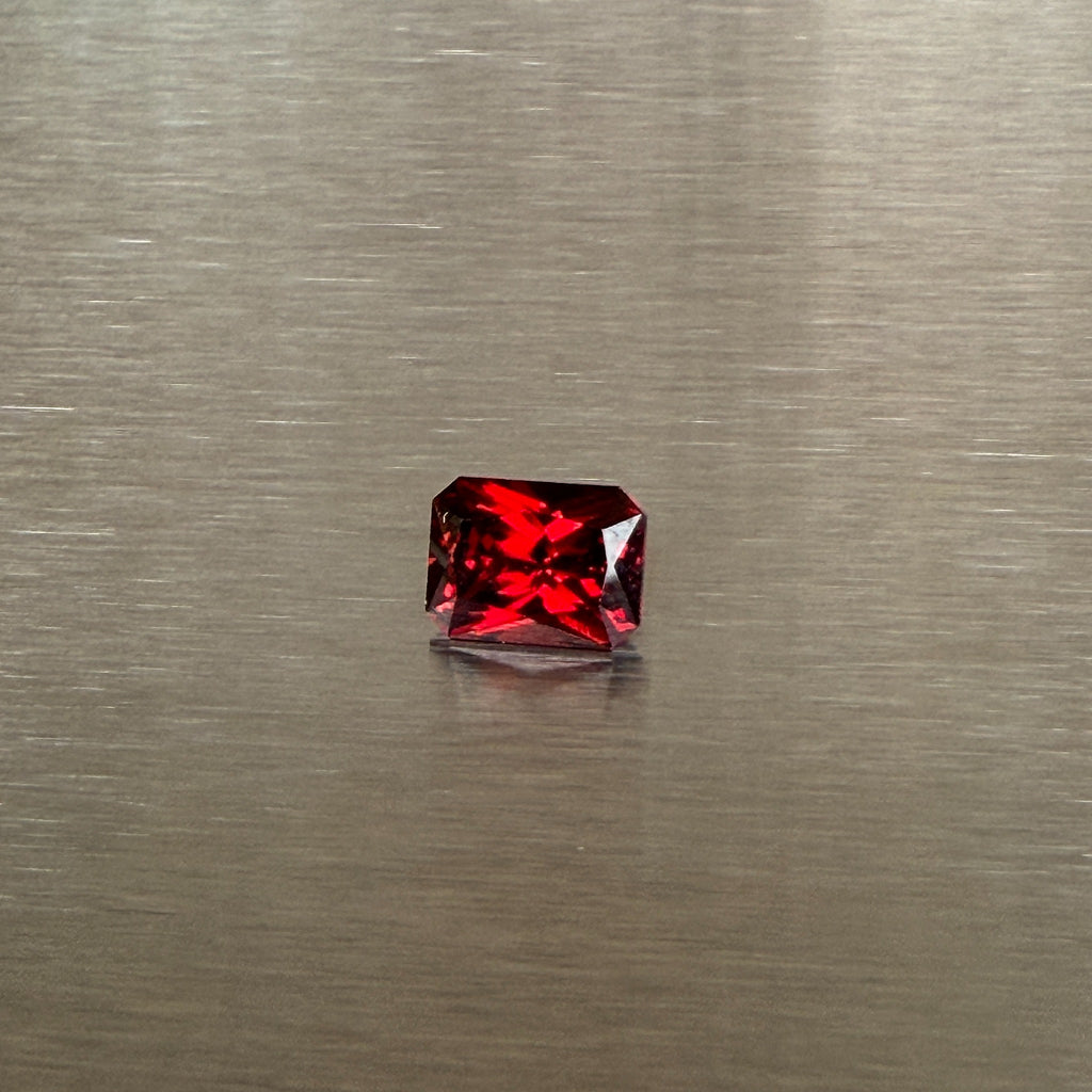 2.18 ct Nigerian spessartite garnet, precision radiant cut, face-up view, Otzera OTZ-2026-01668