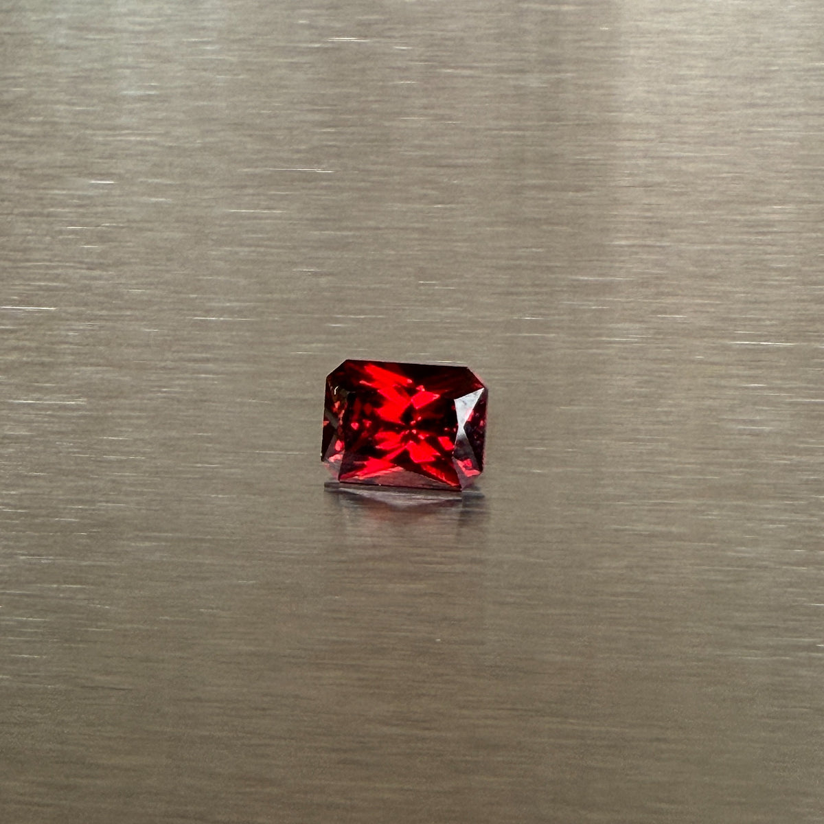 2.18 ct Nigerian spessartite garnet, precision radiant cut, face-up view, Otzera OTZ-2026-01668