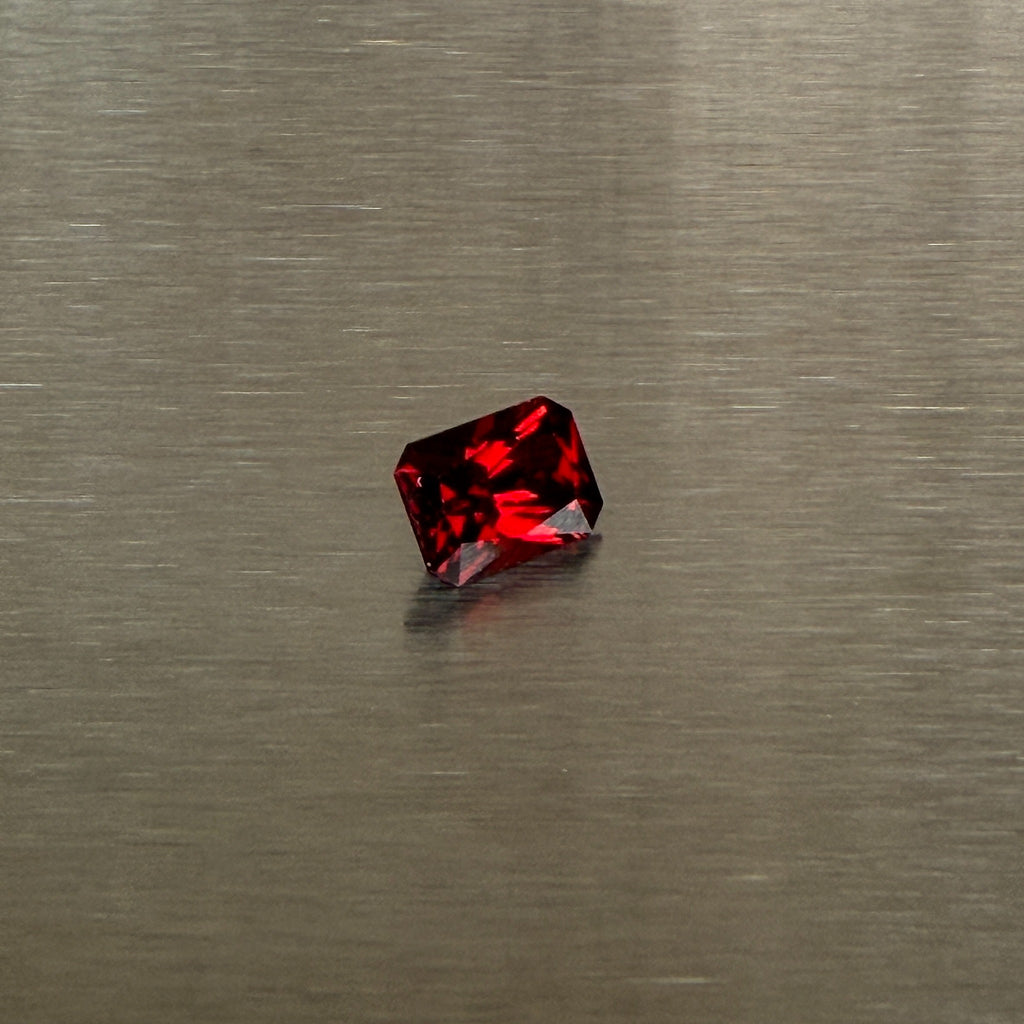 2.18 ct precision-cut Nigerian spessartite garnet, alternate view showing saturated red-orange color, Otzera OTZ-2026-01668