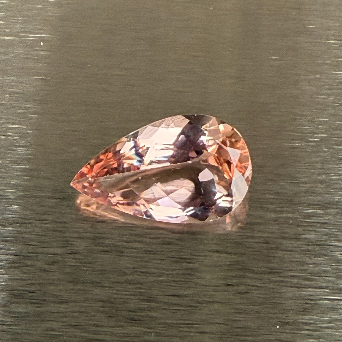 15.18 ct natural morganite, pear modified brilliant cut, face-up view, Otzera OTZ-2026-01669