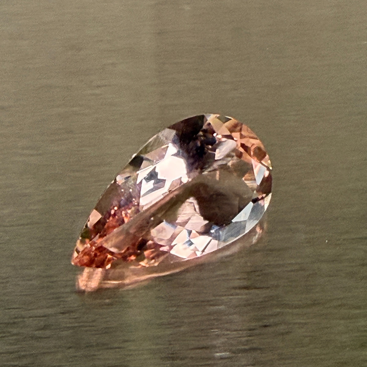 15.18 ct natural morganite, pear modified brilliant cut, alternate face-up view, Otzera OTZ-2026-01669
