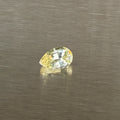 1.24 ct unheated Ceylon yellow sapphire, pear mixed cut, face-up view, Otzera OTZ-2026-01671